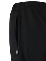 Damen sweathose stay fresh in schwarz mit elastischem bund und kleinem weißen logo seitlich am saum