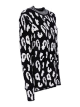 Leopardenprint-Pulli mit asymmetrischem Saum und metallischer Borte.