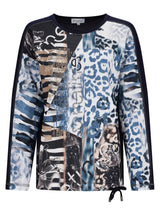 Blau-weißer abstrakter Druck Langarm-Top mit Kordelbund.