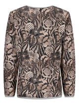 Bluse mit Blumenstickerei in gedämpften Tönen und zarter, spitzenartiger Textur.