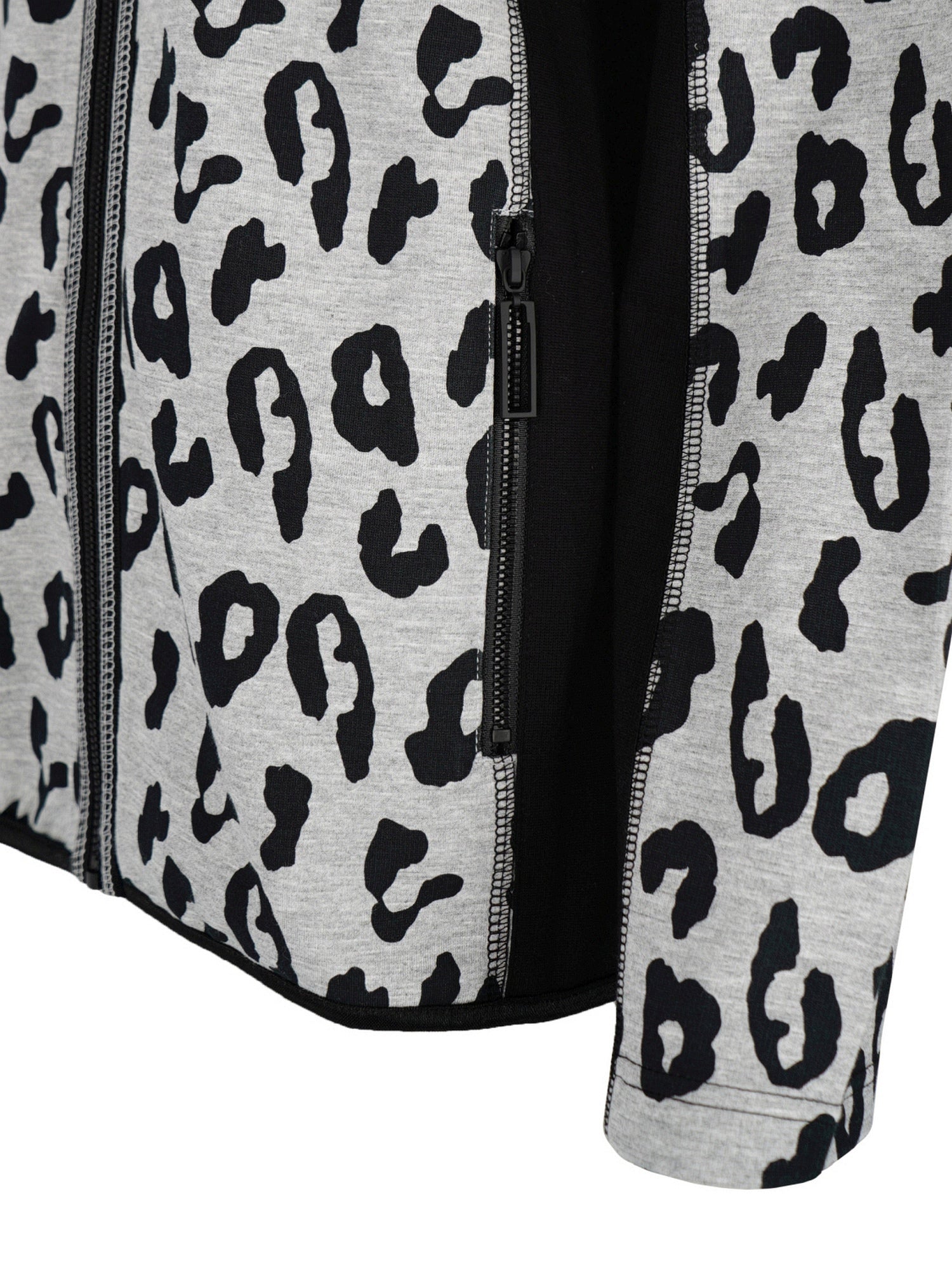 Leopardenmuster-Reißverschlussjacke mit schwarz-weißem Muster, Polyester-Material.