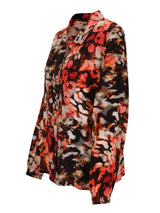 Bluse mit Blumenmuster, langen Ärmeln und Knopfleiste vorne.