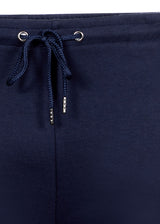 Marineblaue Badehose mit Kordelzug, weißen Nähten und silbernen Ösen.