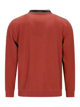 Roter Pullover mit Textur, schwarzem Saum und Kragen, wahrscheinlich Hugo Boss Modell.