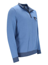 Blauer Viertelreißverschluss-Pullover mit texturierter Strickstruktur und kontrastierendem Kragen, Manschetten und Saum.