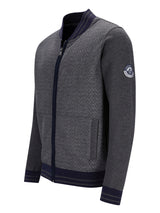 Moncler Bomberjacke mit schwarz-grauem Fischgrätmuster, Reißverschluss.