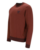 Langärmeliges Herren-Sweatshirt mit Rundhalsausschnitt in rotbrauner Farbe mit dunkelbraunen Rippbündchen an Ärmeln und Saum.