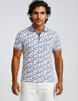 Weißes Poloshirt mit navyblauem Blattmuster und grauen Bündchen