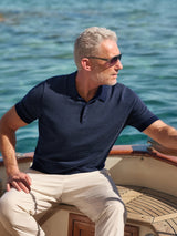 Strickpolo in Blousonform mit Allover-Jacquard, navyblau mit weißem Punktmuster