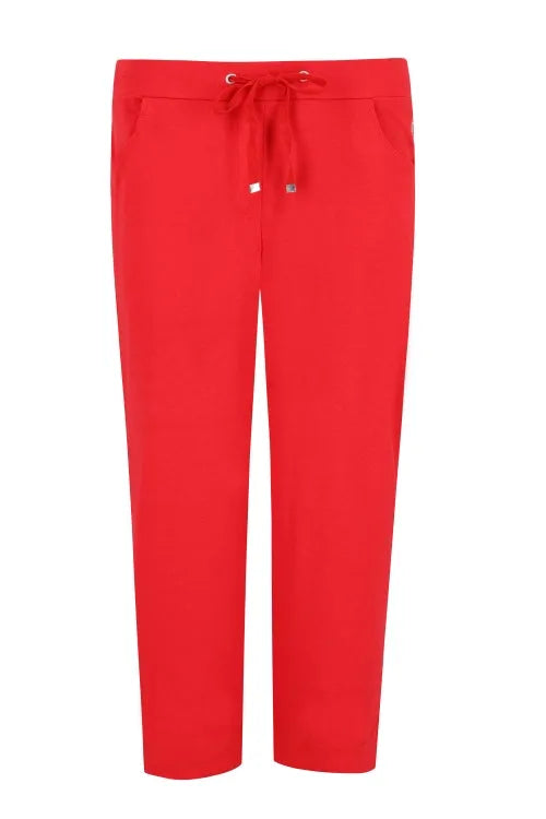 Rote Hose mit Kordelzug, lockerer Passform und elastischem Bund.