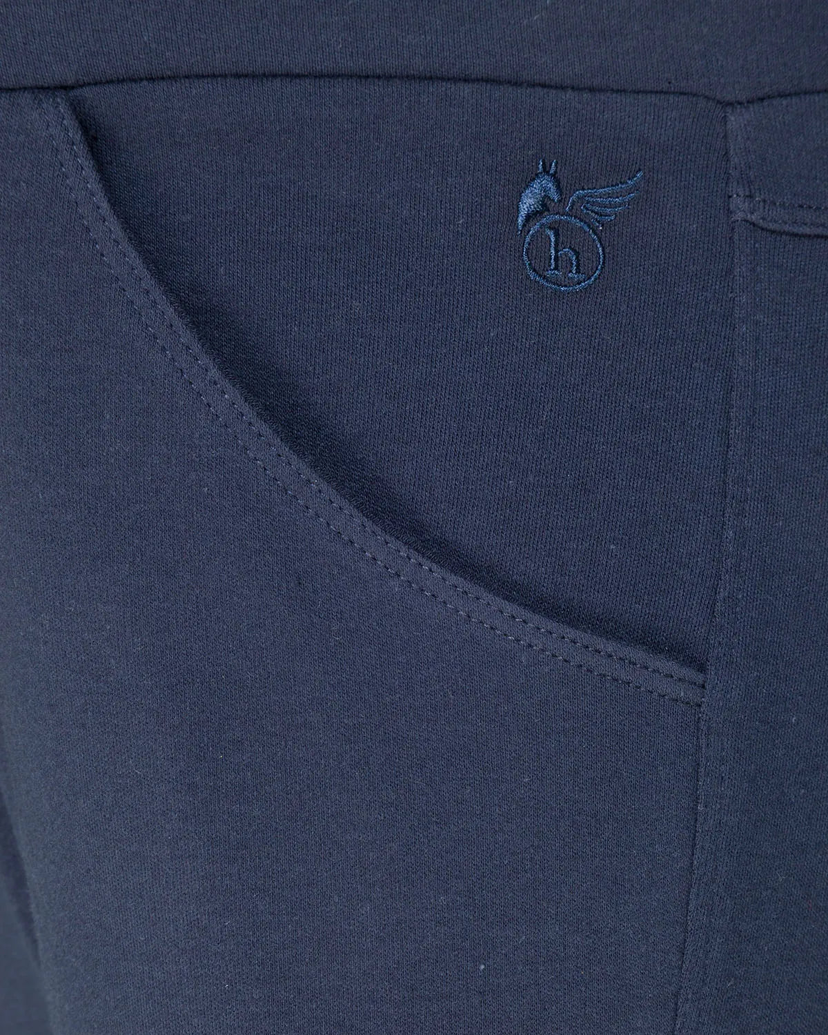 Marineblaue, dehnbare Leggings mit einem kleinen Logo am Bund.