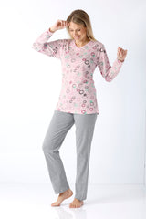 Damen Schlafanzug Klima-Light® mit pinkem Langarmshirt v ausschnitt und kreismuster, kombiniert mit grauer Hose