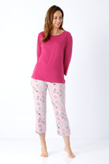 Damen schlafanzug 7/8 klima-light® mit rosa langarmshirt und pastellfarbenen caprihosen mit kreismuster