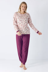 Damen schlafanzug mit bündchen frottee bestehend aus rosa langarmshirt mit herzmotiv und lila joggerhose