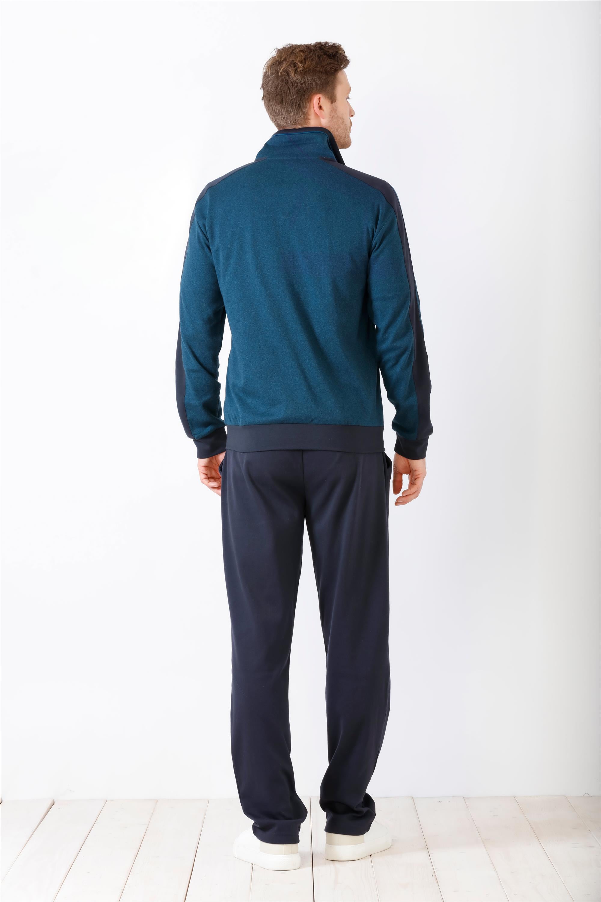 Blaugrüne Herren-Trainingsjacke mit Reißverschluss und dunkelblauen Abschlüssen.