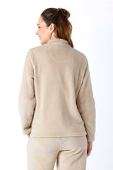 Damen nicki anzug beige fleece zip jacke mit hohem kragen und dezentem rundem patch auf der rückseite