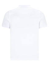 Weißes kurzärmeliges basic piqué-poloshirt mit klassischem kragen und minimalistischer design aus baumwolle