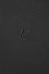 Schwarze Leder Brieftasche mit Harry Potter Hogwarts Wappen.