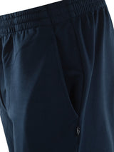 Dunkelblaue basic sweathose mit elastischem bund und seitentaschen aus atmungsaktivem material