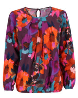 Bluse mit Blumenmuster, langen Ärmeln und Schlüssellochausschnitt.