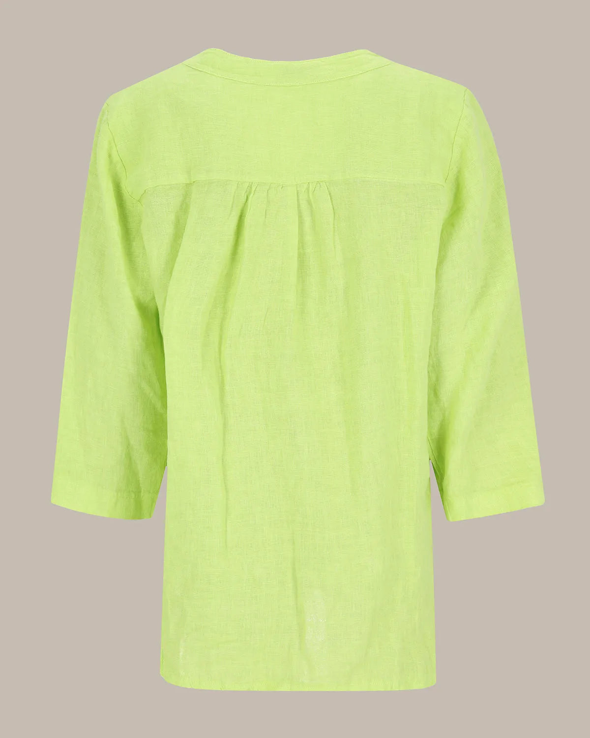 Neongrüne Bluse mit Dreiviertel-Ärmeln und plissierter Vorderseite.