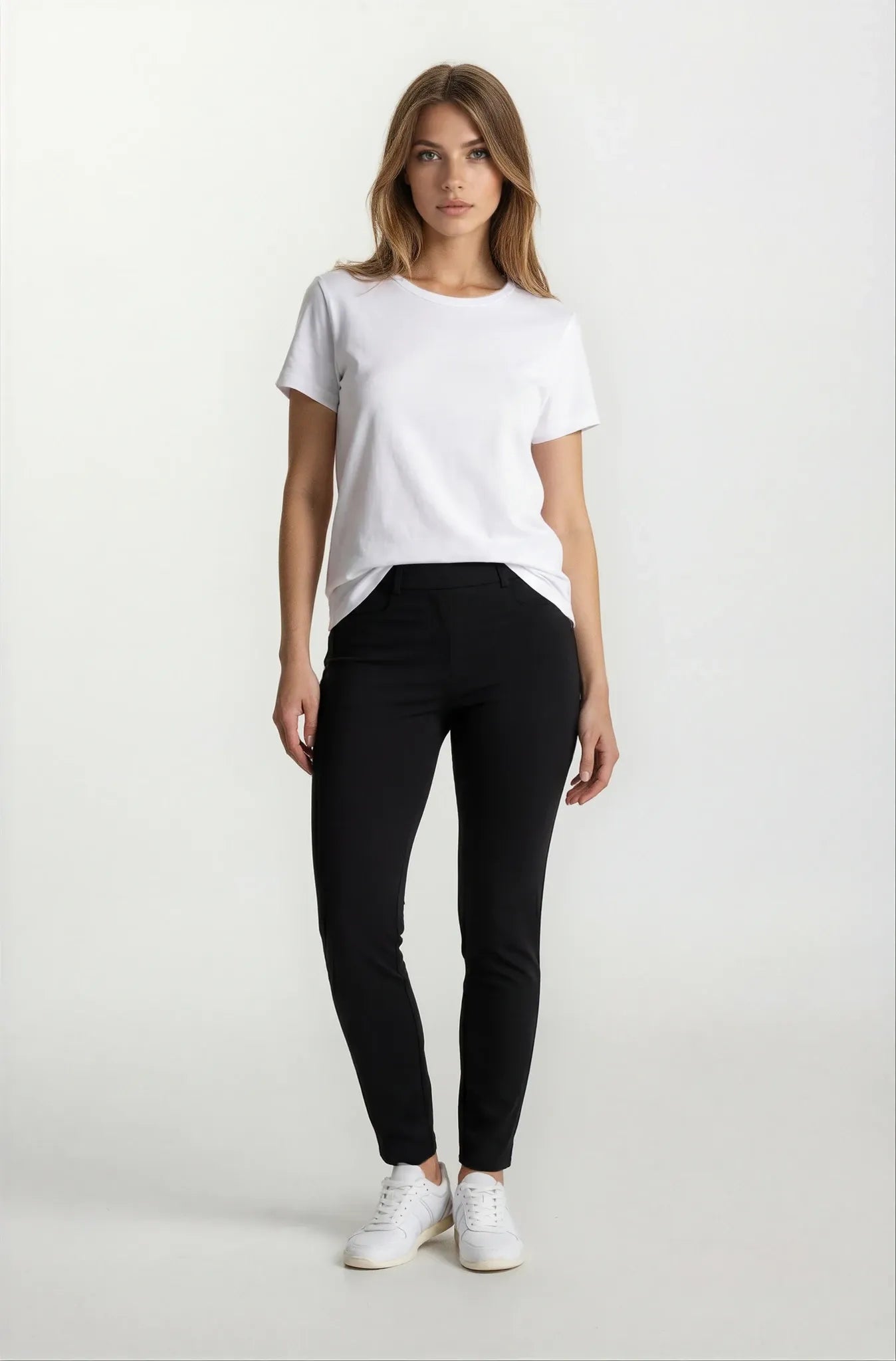Schwarze hochbundige Slim-Fit 7/8 Stretchhose für Damen Rückseite
