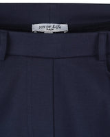 Damen 7/8 interlock stretchhose in navyblau mit joy of life markenlabel am bund