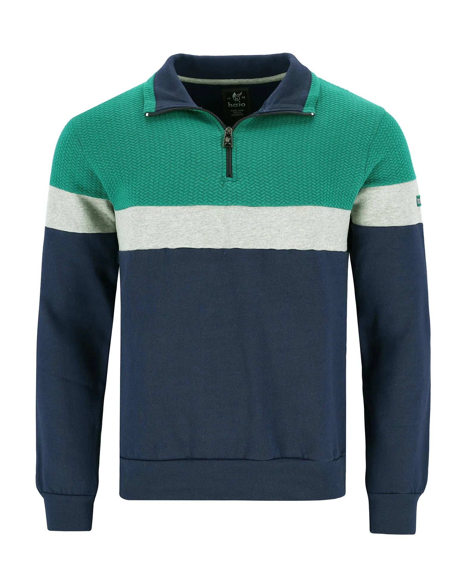 Marineblauer, grüner und weißer Pullover im Farbblock-Design mit halbem Reißverschluss.