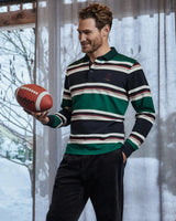 Grün und marineblau gestreiftes Rugby-Shirt mit weiß-rot-schwarzen Akzenten und einem Logo auf der Brust.