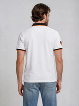 Weißes hajo fanshirt stay fresh® polohemd mit schwarzem und orangefarbenem rand und deutschem flaggenpatch am linken ärmel