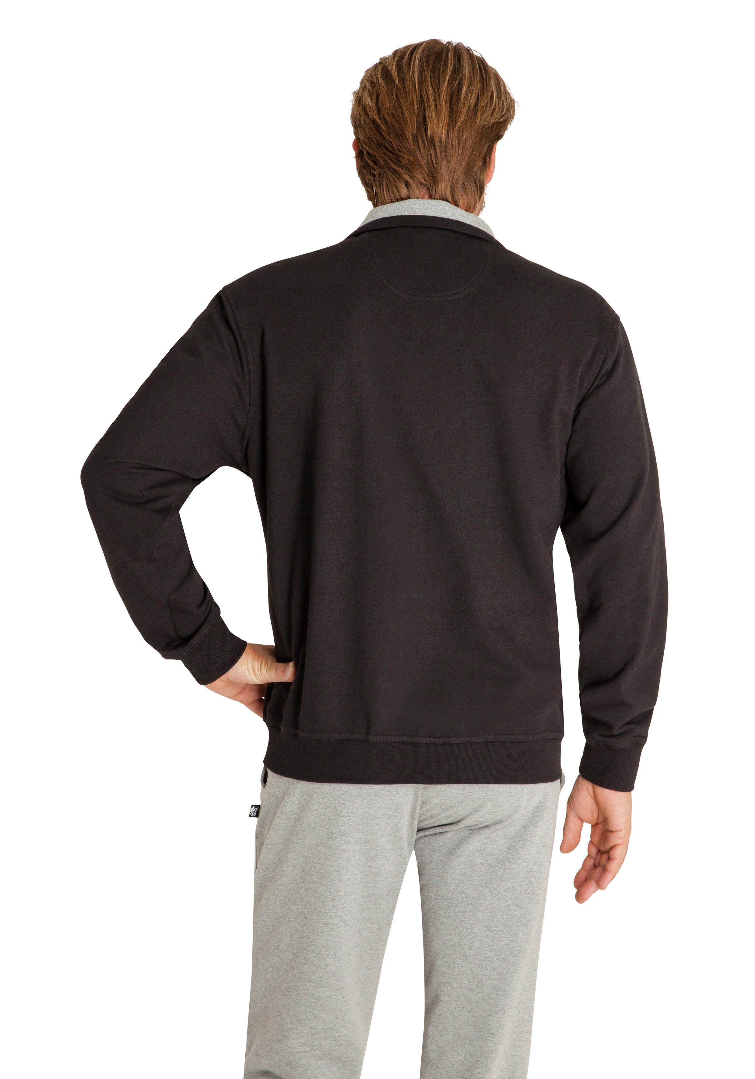 Schwarze Jacke mit Reißverschluss und weißem Kragen und Ärmelbündchen, aus Fleece.