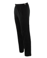 Schwarze Stretch-Hose mit silbernem Reißverschluss am Knöchel.