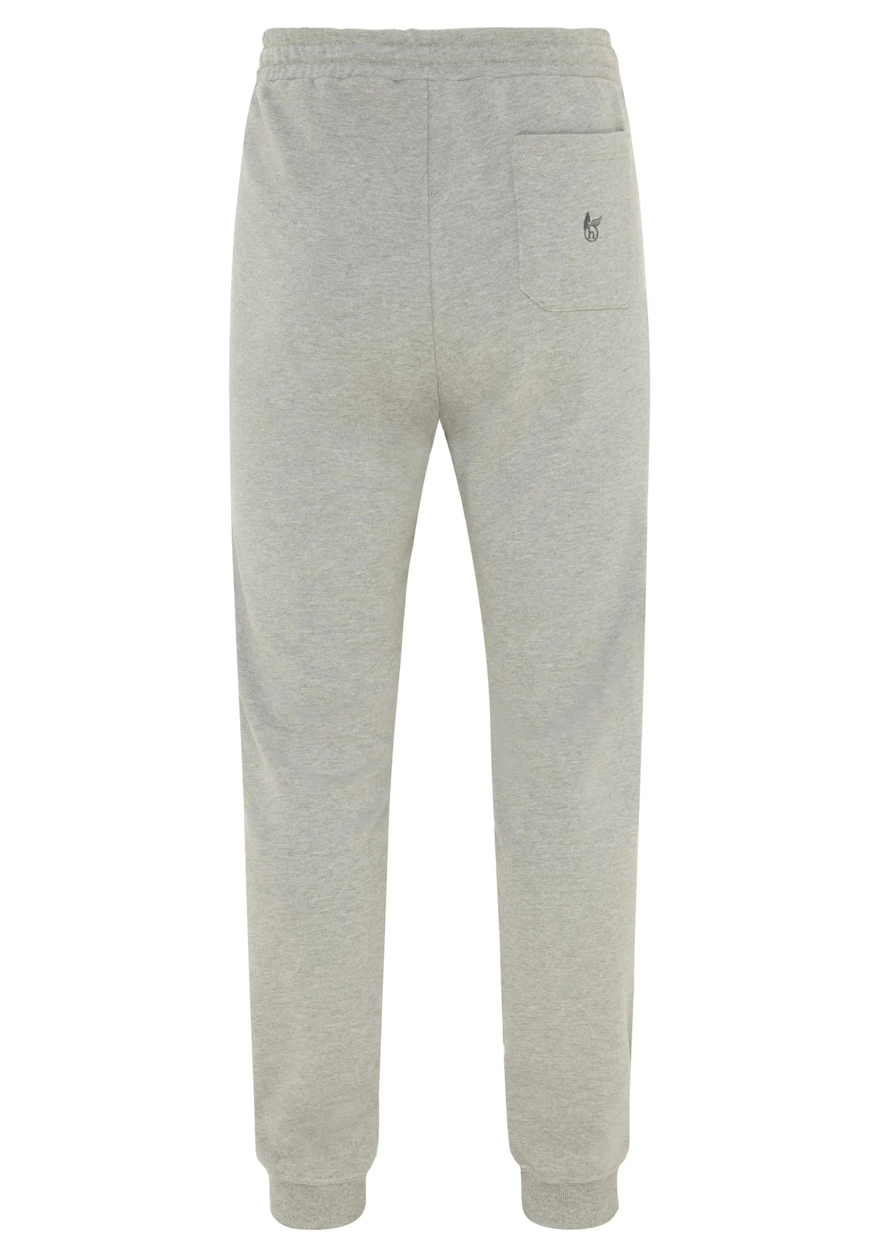 Hellgraue Jogginghose mit elastischem Bund und Kordelzug, mit einem kleinen gestickten Logo auf dem linken Bein.