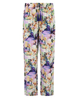 Pyjamahose mit Blumendruck und einer Mischung aus Pastellfarben und lila Akzenten, wahrscheinlich aus weicher Baumwolle oder Polyestermischung.