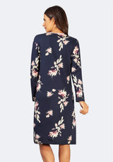 Marineblaues Kleid mit Blumendruck, langen Ärmeln und geradem Schnitt.