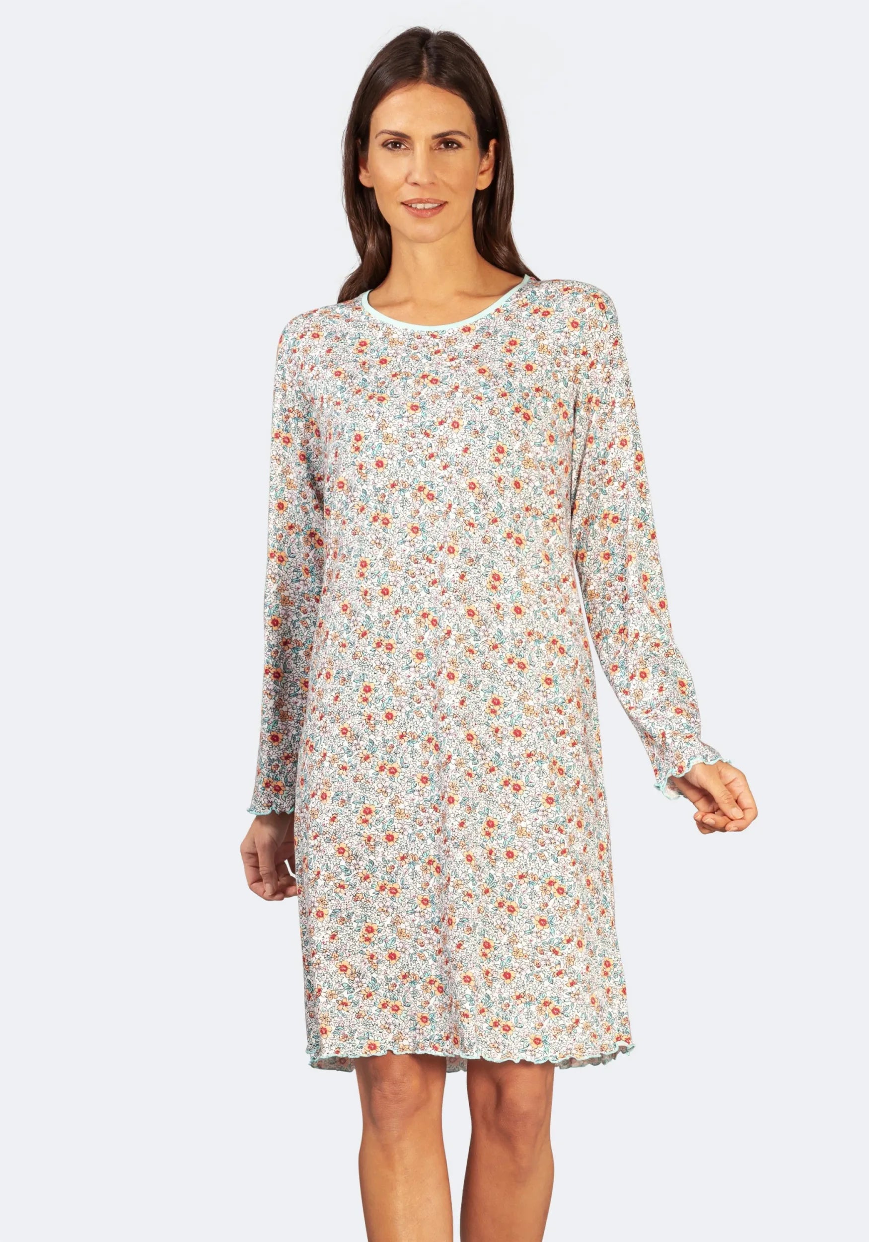 Cremefarbenes, langärmeliges Kleid mit Blumendruck, Rundhalsausschnitt und elastischem Bund.