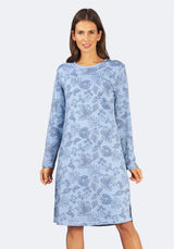 Hellblaues, langärmeliges Kleid mit Blumendruck und lockerer Passform.