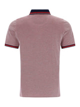 Pikee-Poloshirt in Dreitonoptik: dustrosafarbener Poloshirt mit gestricktem Dreitonstoff, Marine-Navy-Rot-Streifen am Kragen und Ärmelbündchen
