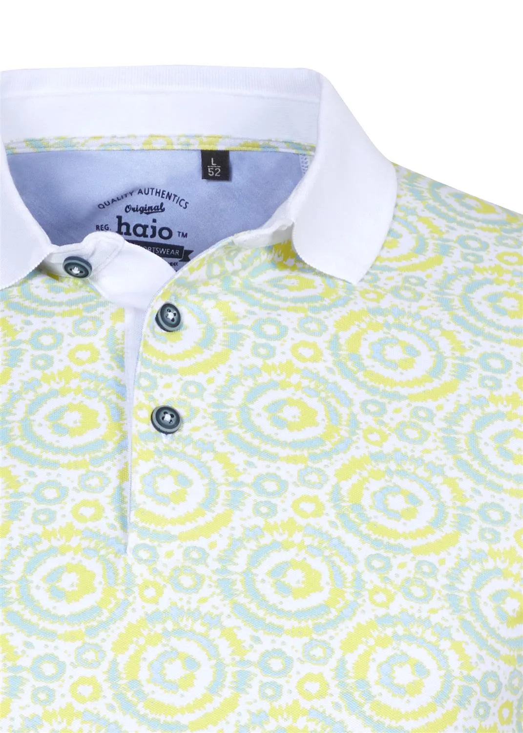 Poloshirt mit kreisförmigem Muster in Gelb und Grün auf weißem Grund, aus Baumwolle.