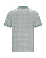 Hellgrünes Poloshirt mit geometrischem Muster und Kontrastnähten, wahrscheinlich aus Baumwoll- oder Polyestergemisch.