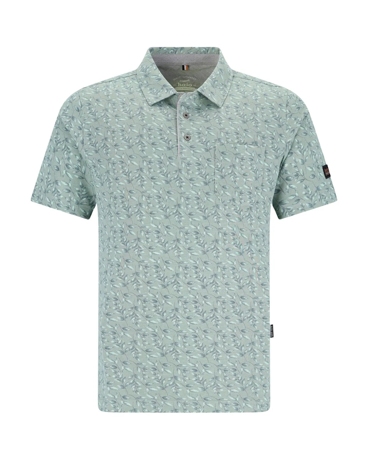 Mintgrünes, geblümtes Poloshirt mit kurzen Ärmeln und Kragen, aus Baumwolle.