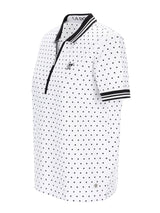 Poloshirt mit Tupfen-Print: weiß mit schwarzen Punkten, schwarzem Kragen und Bündchen