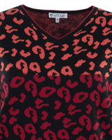 Pullover mit Leopardenmuster und Spitzenbesatz, schwarz-rotes Design.