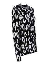 Leopardenprint-Pulli mit asymmetrischem Saum und metallischer Borte.