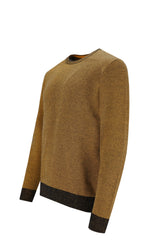 Senfgelber strukturierter Pullover mit schwarzen Bündchen und Saum, möglicherweise von h&m.