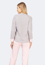 Hellrosa und weiß gemusterter Blazer mit dezentem geometrischem Muster.