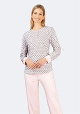 Lavendel und weiß gemusterter Pullover mit langen Ärmeln, weiches Material.