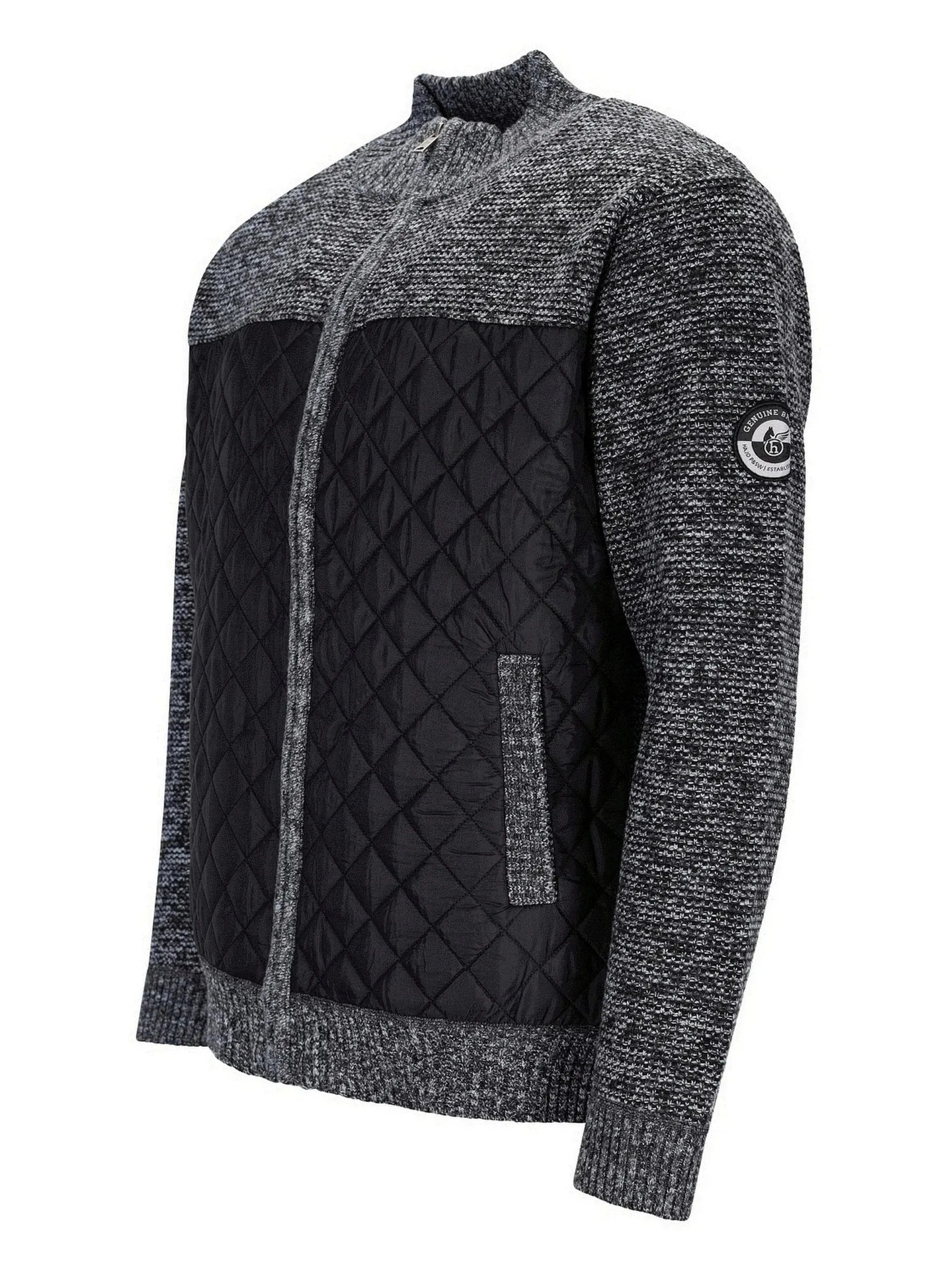 Kohle-graue und schwarze Steppjacke mit strukturiertem Strickmuster.