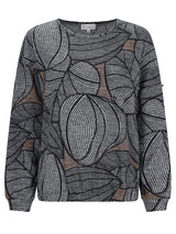 Schwarz-weißer abstrakter Musterpullover mit gerippten Ärmeln.