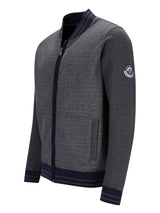 Moncler Bomberjacke mit schwarz-grauem Fischgrätmuster, Reißverschluss.